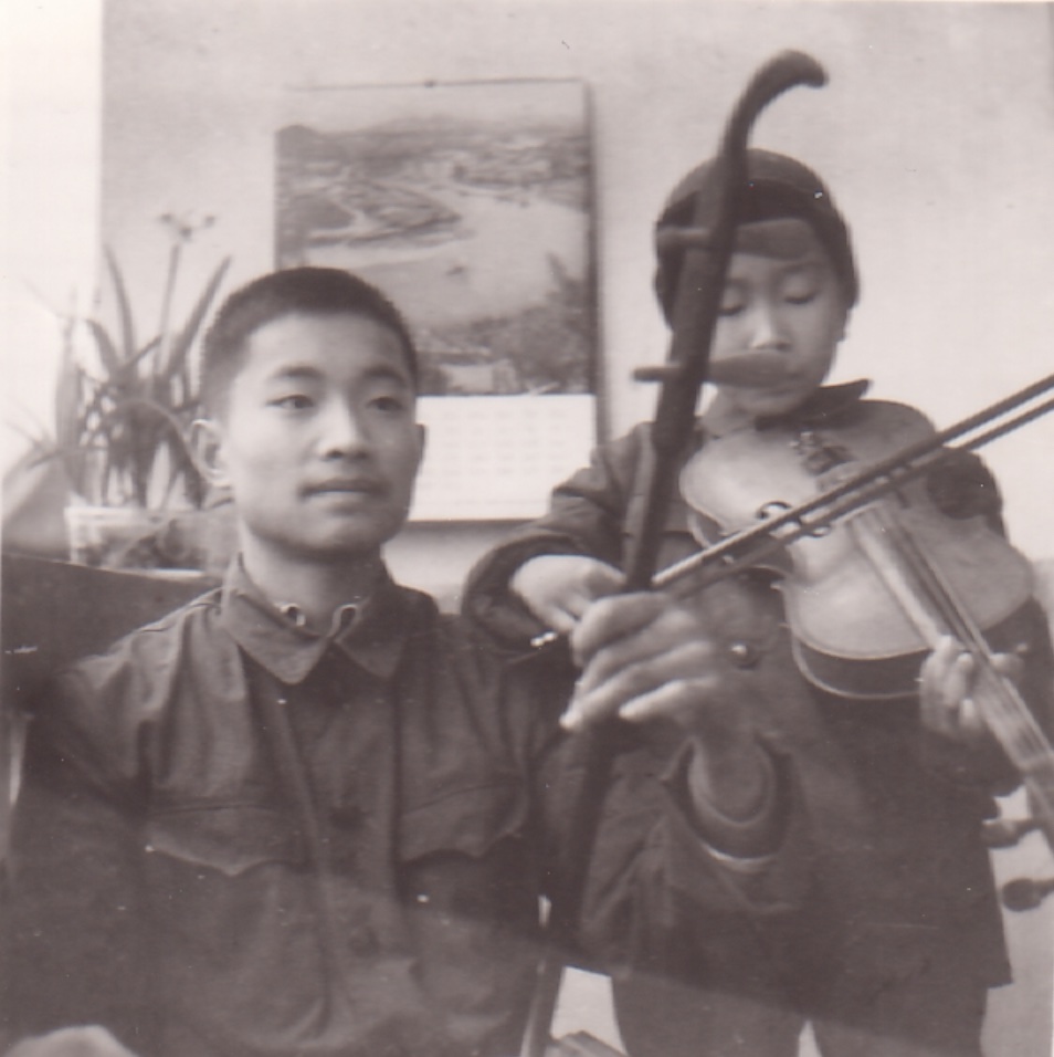 Jesus Calling Podcast 421 featuring Dr Ming Wang - shown here as a young violinist